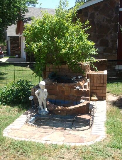 q what can i plant in my containers attached to my fountain, container gardening, flowers, gardening, outdoor living, My fountain that I am working on Need ideas for the right and left container beds