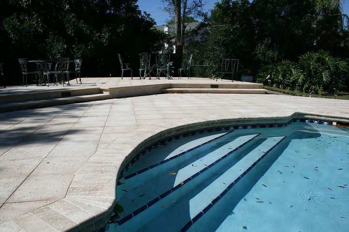 renovating a pool deck without removing old cracked concrete deck, After pavers installed on the top of the old cracked concrete deck Pavers installed over sand They will absorb small shifts and will not crack