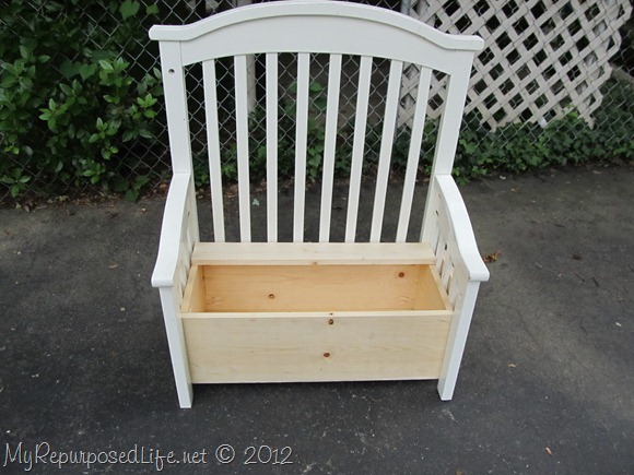 upcycled repurposed crib into toy box bench, I used screws through each of the side slats and the back of the bottom brace to attach the box to the new bench