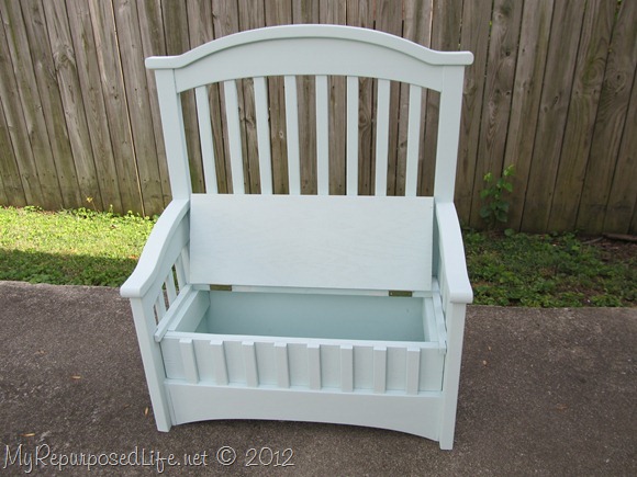 upcycled repurposed crib into toy box bench, I added hinges and a safety hinge not shown I painted it a very light blue green Note I drilled holes in the bottom for ventilation in case a child closes the lid while in the box
