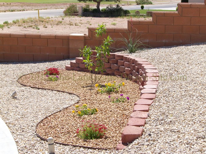 desert southwest landscaping on a small hillside circular driveway using retaining, This planting area top view shows the retaining wall we created to address the steepest area of the landscape The planting bed design shape is just something simple to add a little more character than just a circle or a square box