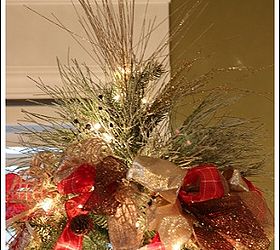 how to decorate a christmas tree with only ribbon and greenery, christmas decorations, crafts, seasonal holiday decor, Instead of one huge bow at the top I used frosted branches and smaller loop bows around the bottom of the branches