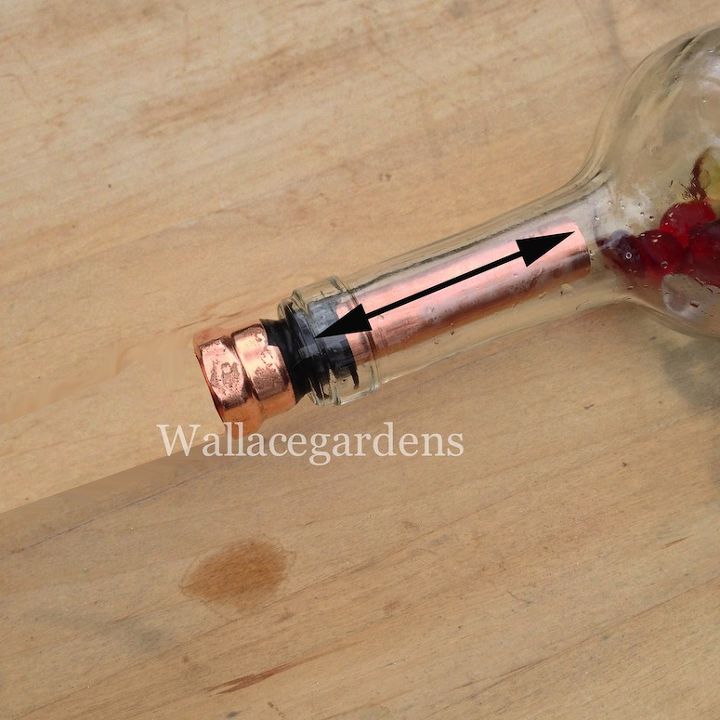 wine bottle watering device with copper tubing for container gardens