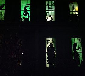 diy halloween silhouettes, crafts, halloween decorations, seasonal holiday decor, Whole house transformation My upstairs windows on the left were tricky those are loft windows so we kept those simple