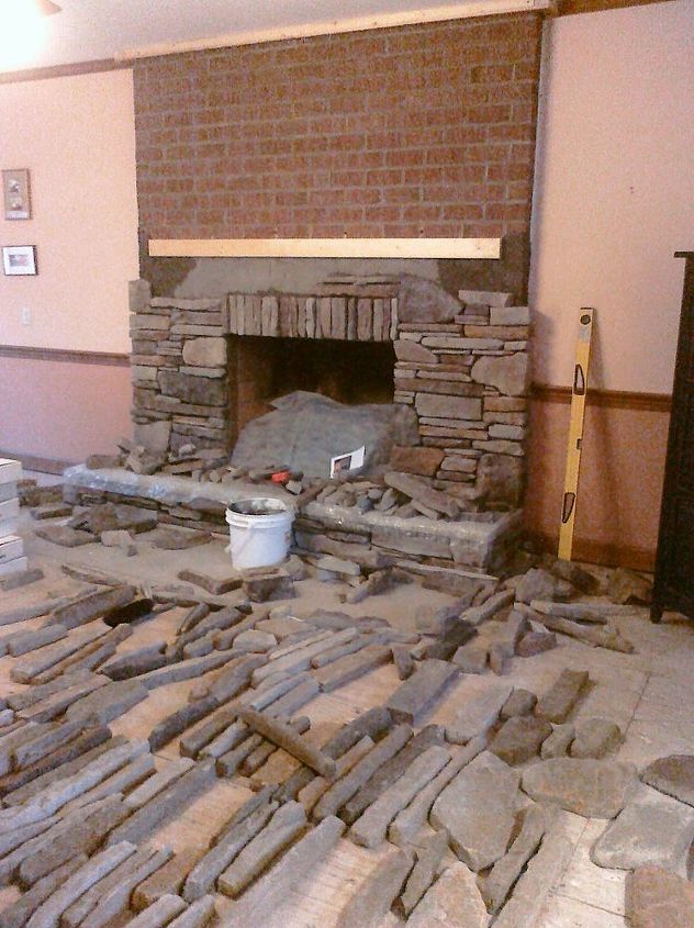 as the fireplace surround is re faced, concrete masonry, fireplaces mantels, home decor, home improvement, Lord please let me have enough stone This dry stack is making me think too hard