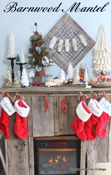 barnwood christmas mantel, fireplaces mantels, seasonal holiday d cor, The completed barnwood mantel all decorated for Christmas