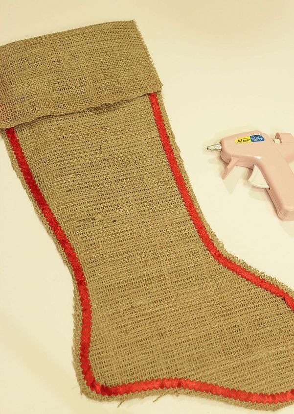 no sew burlap stockings, crafts, seasonal holiday decor, Add glue around the edge of one of the cut outs and place the other cut out on top to bond both pieces together Keep working all around the stocking Add decorative trim
