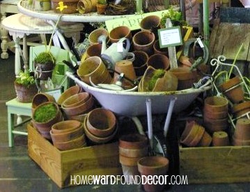 pot head, gardening, a Plethora of Pots in a vintage show booth display