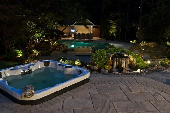 award winning backyard retreat includes portable spa, outdoor living, pool designs, spas, Bulfrog Spa JetPaks Portable spa was set against upper patio to look built in and to allow spa users to enjoy beautiful waterfall and lower pool area Where you sit in spa is fitted with individual interchangeable massaging JetPaks