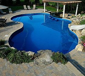 enjoying a tropical holiday every day, decks, outdoor living, patio, pool designs, Patio Landscaping Matching steps walls coping and moss rock add elegant finishing touches to the Techo Bloc patios
