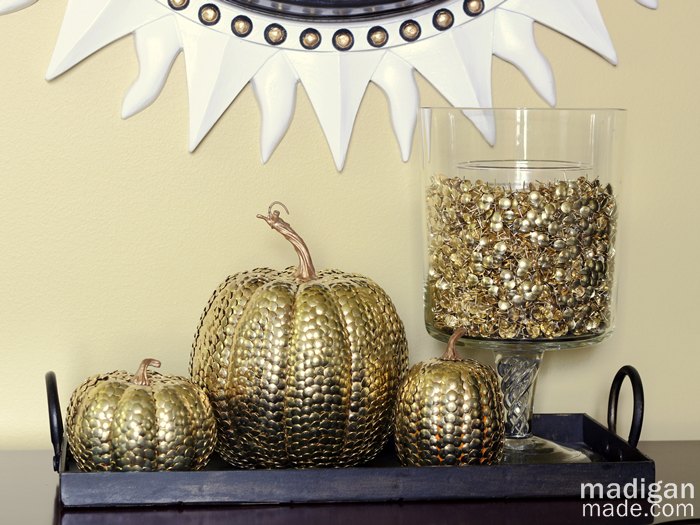 simple handmade fall decor ideas, crafts, halloween decorations, seasonal holiday decor, Gold thumbtack covered pumpkins and vase filler glam up a table for fall
