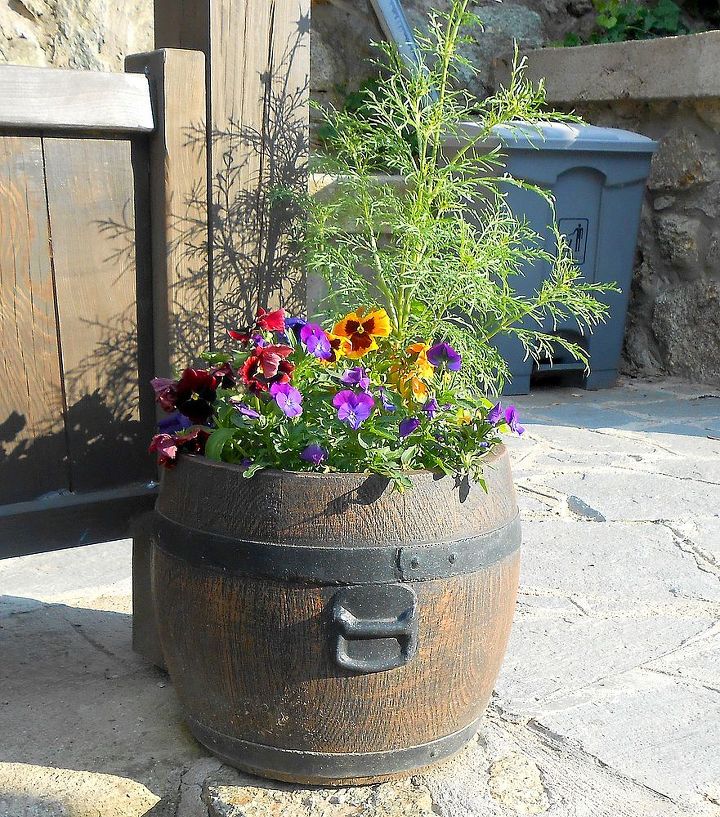 flower ideas for barrel pots and planters, flowers, gardening, repurposing upcycling, purple and yellow pansies