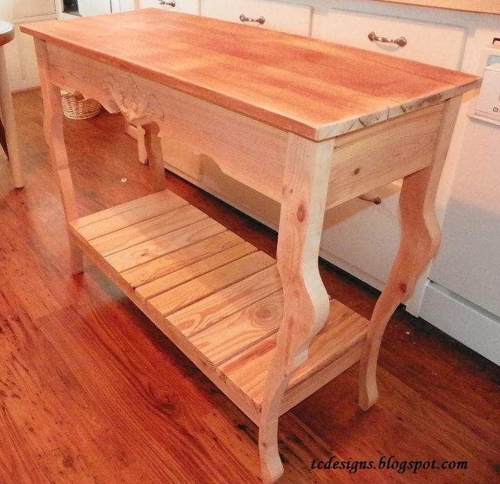 a sofa hall table made from re cycled wood, painted furniture, pallet, woodworking projects, Table all put together made from all recycled wood Top was made from Wood Floor Sides and Shelf Made from Scrap Pallet wood and legs made from scrap pieces of 2x6 Read the full tutorial here