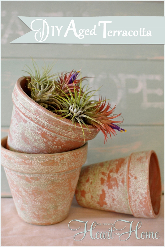 aging terra cotta pots the easy way, crafts, gardening, The finished pots after just a little paint and sand paper xo
