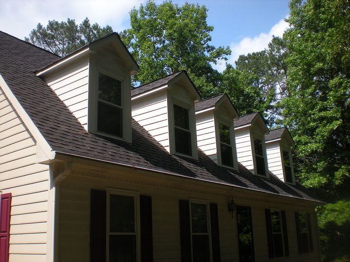 hardi board siding install, curb appeal, re did sides of dormers
