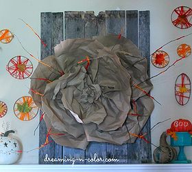 pallet art, crafts, home decor, pallet, repurposing upcycling, wrapped twigs with yarn and made a huge paper flower Stapled to board and inserted twigs It is a beautiful statement piece to the room