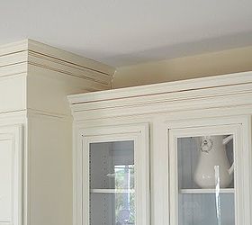 how to heighten the tops of your kitchen cabinets, kitchen cabinets, kitchen design, woodworking projects, Caulk away hiding all imperfections Paint