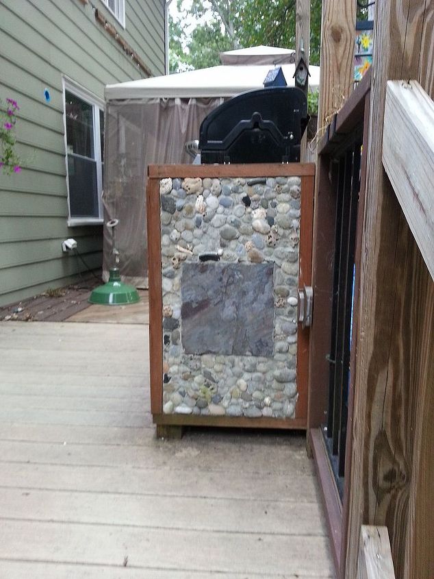 making your grill look built in, These rocks I picked up on the beach at Camp LeJeune NC when my son was stationed there I love these rocks so I had to use them also been there for 3 years
