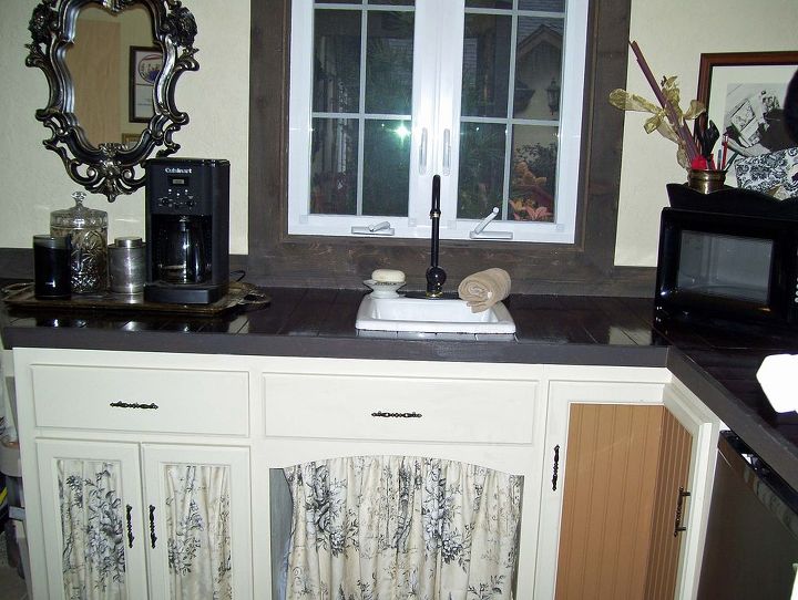 a countertop that looks great and doesn t break the bank, countertops, laundry rooms, Just a picture to give you an idea of how to use the fabric and also the same beadboard on another door