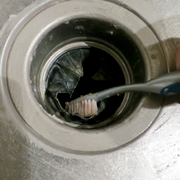 how to clean stainless steel sinks and make them shine, cleaning tips, kitchen design, Clean both sides of flap and around drain with toothbrush