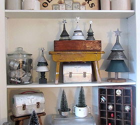 adding funnel trees to your christmas decor, christmas decorations, repurposing upcycling, seasonal holiday decor, The whole vignette with crates a bench bread box lunch boxes bottle brush trees and crocks