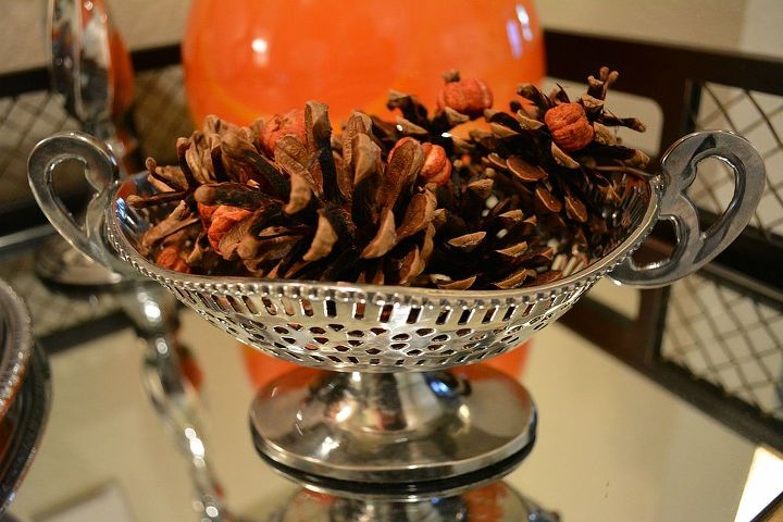 my fall decorated bar table, seasonal holiday decor, I placed some scented pinecones in a silver dish