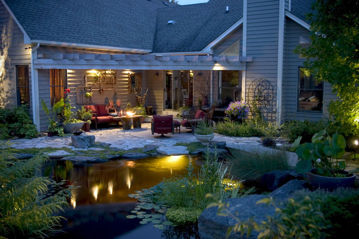 create a romantic summer evening with underwater lighting, outdoor living, ponds water features, Pond lighting casts a cozy glow beneath the surface of the pond