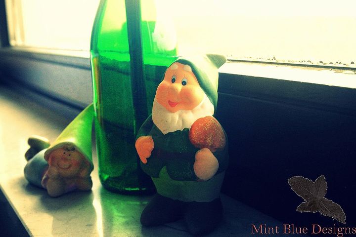 placement of garden gnomes, gardening, Here are some Go green fellows that go perfectly well next to an empty wine bottle on your window sill If its snowing outside even better