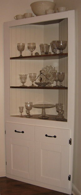 homemade corner cabinet, diy, kitchen cabinets, woodworking projects, The finished cabinet It is essentially a three cornered frame where the frame supports the shelves You can add bead board or any other type of backing