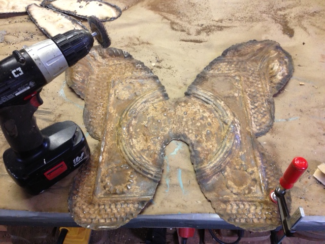 morphing antique tile in to a butterfly, crafts, repurposing upcycling, I used a wire brush attachment and my cordless drill to remove the layers of paint