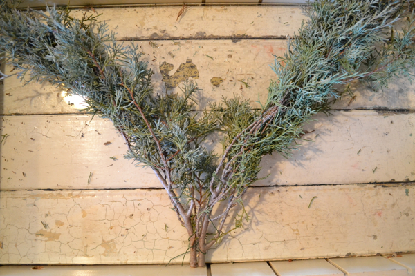 easy breezy valentine evergreen heart, crafts, seasonal holiday decor, valentines day ideas, Tied together to form a V