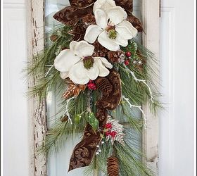 christmas door swag with magnolias, christmas decorations, seasonal holiday decor, Red berries snow twigs velvet brown leaves and glitter leaves made the whole swag gorgeous in my humble opinion