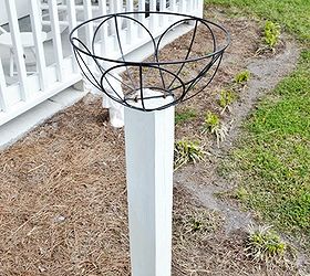 how to mount flower baskets onto wooden posts, curb appeal, diy, flowers, gardening, how to, repurposing upcycling, woodworking projects, We used U shaped staples to secure the wire baskets onto the posts