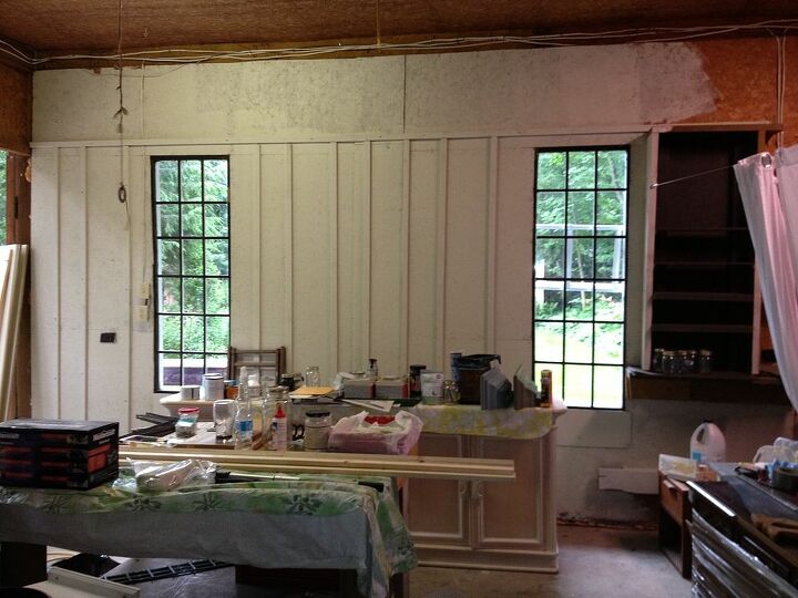 workshop makeover, diy, garages, home decor, how to, One wall finished and window frames painted a black brown