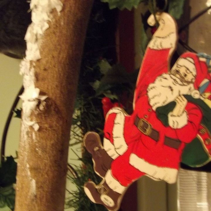 tree branch becomes a place to hang your hat, crafts, repurposing upcycling, seasonal holiday decor, Santa hangs around