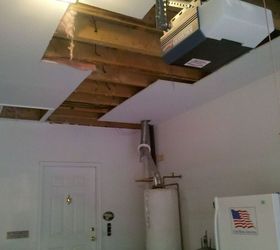 the joys of construction adding a home office, doors, garage doors, garages, home improvement, New water lines had to be installed along with two new water heaters therefore the garage ceiling had to be cut