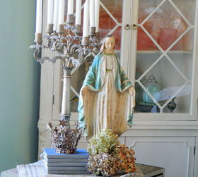 trend alert religious items used as home decor is huge right now, home decor, Candelabrum add grandeur to any space and balance the large Madonna statue
