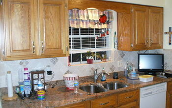 This is a photo of the same cabinets with a little trim ,one gal of paint and a little glaze.