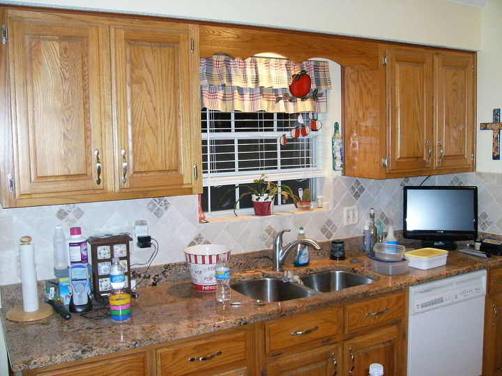 this is a photo of the same cabinets with a little trim one gal of paint and a, kitchen design, This is a kitchen with old existing stain and exposed hinges