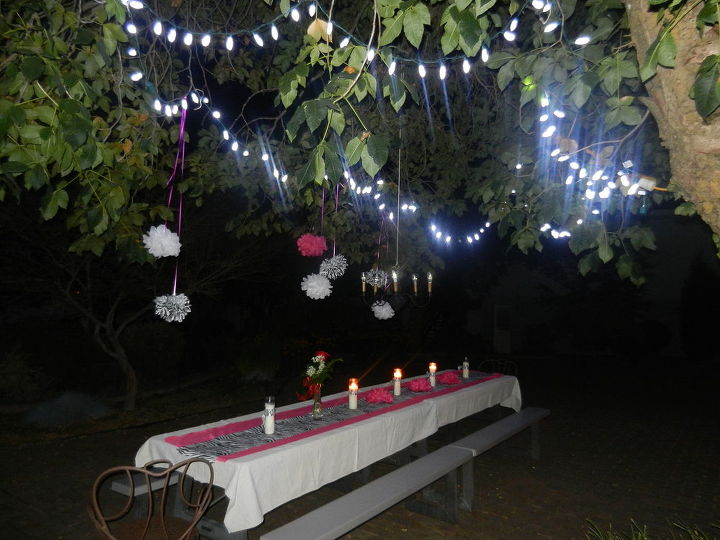 zebra and pink courtyard table scape for sweet 16 party, home decor, outdoor living, White LED Christmas lights were hung in the tree to add light and ambience