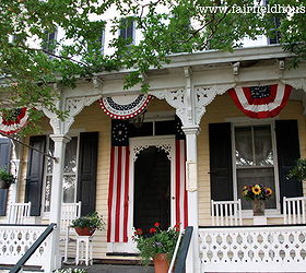 a favorite outdoor space a patriotic victorian farmhouse front porch, curb appeal, outdoor living, patriotic decor ideas, porches, The Fairfied House Patriotic Front Porch