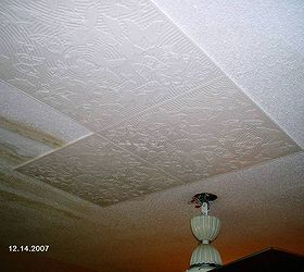 diy styrofoam ceiling tile over water stained popcorn ceiling, Guest Bedroom during see water stains on existing popcorn