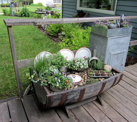 top flower junk garden posts 2012, container gardening, flowers, gardening, repurposing upcycling, succulents, In Return to the Kitchen Fairy Garden I added a fairy and shared an update on the plants