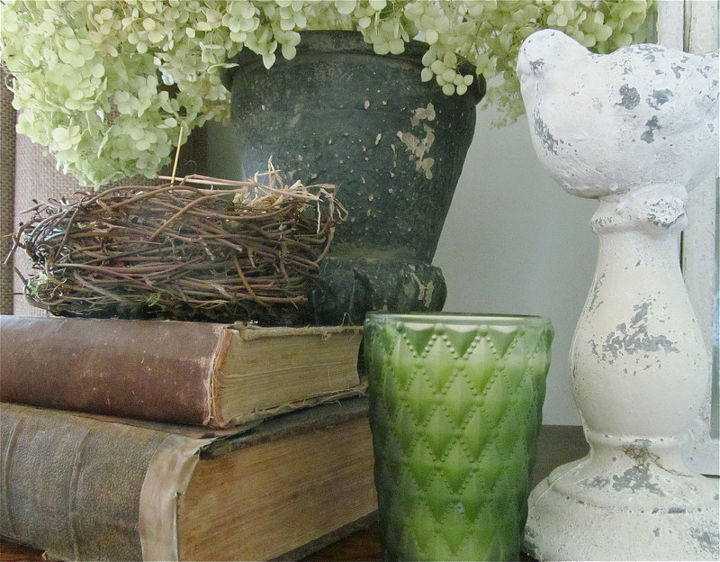 adding a pop of green to a mostly neutral room, home decor, Dried hydrangeas and a green glass candle from TJ Maxx
