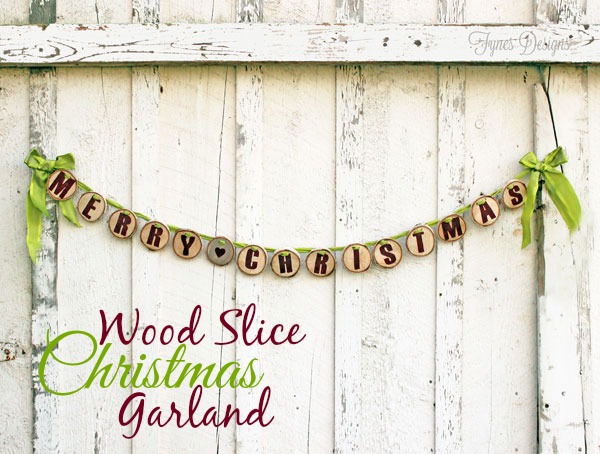 merry christmas wood slice garland, christmas decorations, crafts, seasonal holiday decor, Cut rounds of a log use paint to stencil letters on drill holes and tread a ribbon through EASY to create this Christmas Garland