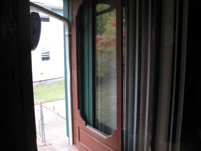 screen door repair, Here is the door with the damaged screen that is to be repaired