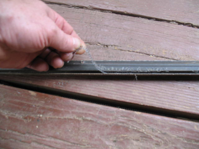 screen door repair, Clean out any pieces of old screening that remain in the groove