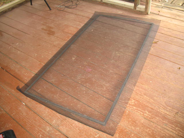 screen door repair, Here is a view of the new screening that is several inches larger than the frame all around