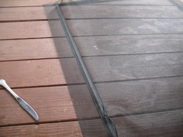 screen door repair, Gradually work the rubber down into the groove Pay attention the the lines in the screen to assure it is going in straight