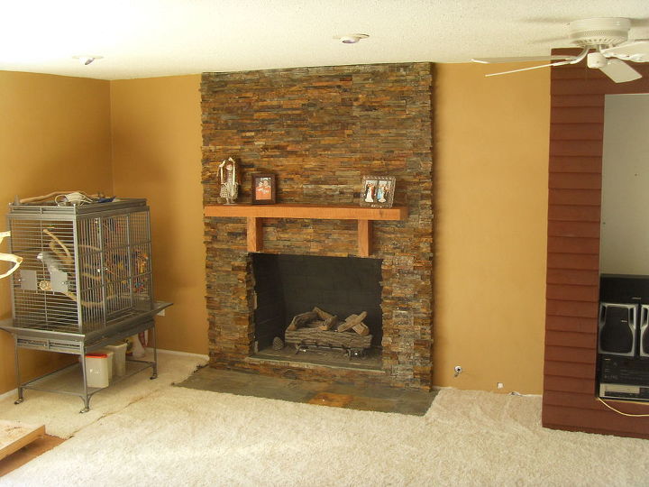 this is a stacked stone fireplace we re vamped in two and a half days this was a, concrete masonry, Final result